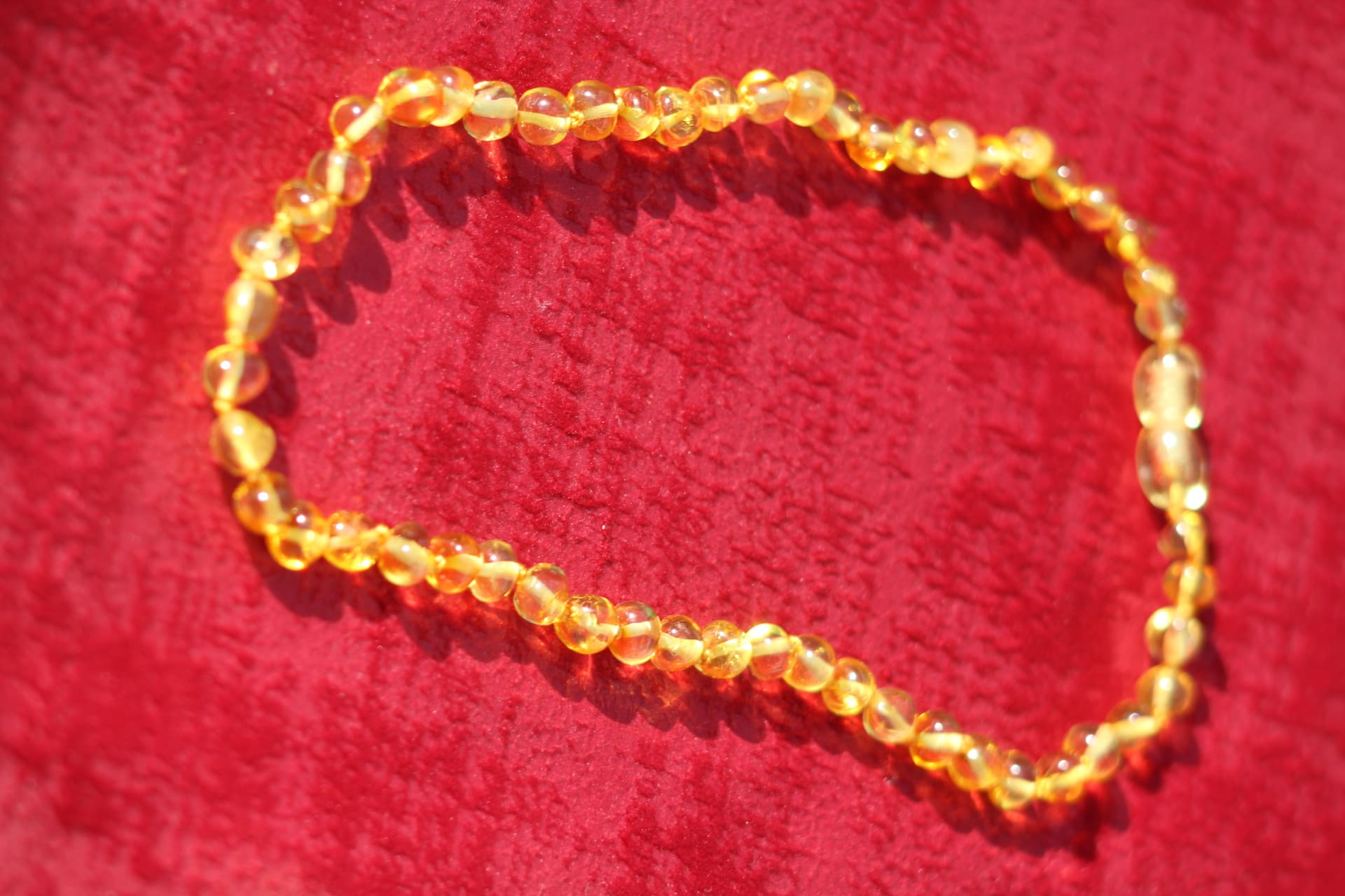 Collier Ambre enfant fermeture vis