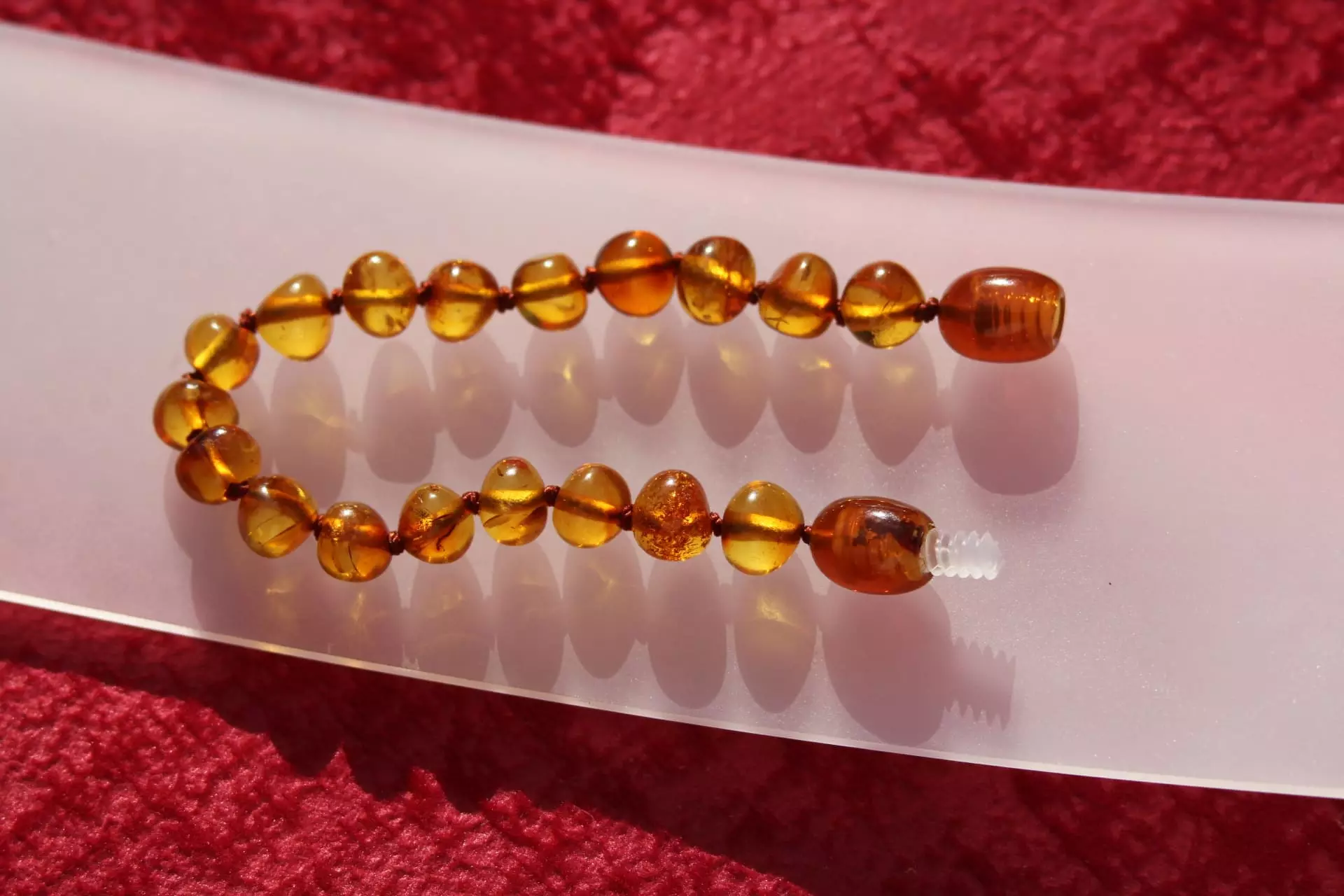 Collier ambre bébé fermoir à vis